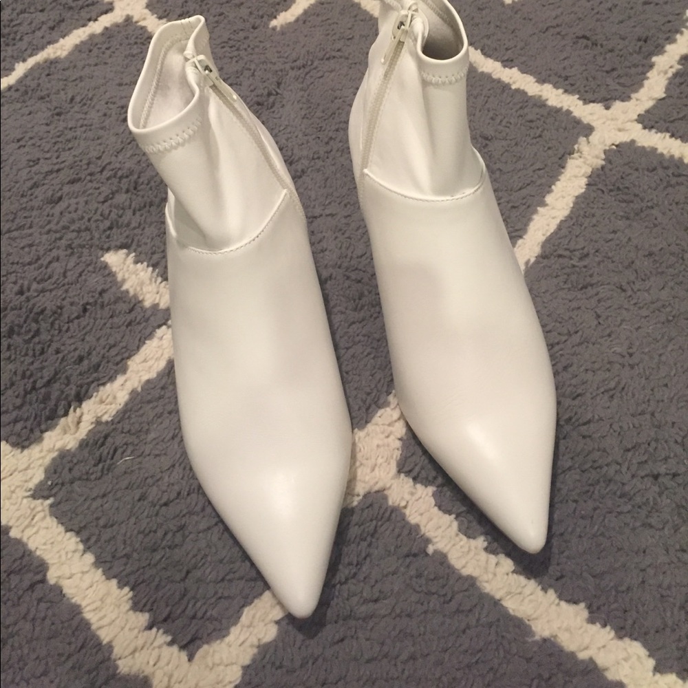 White leather pointy toe bootie.